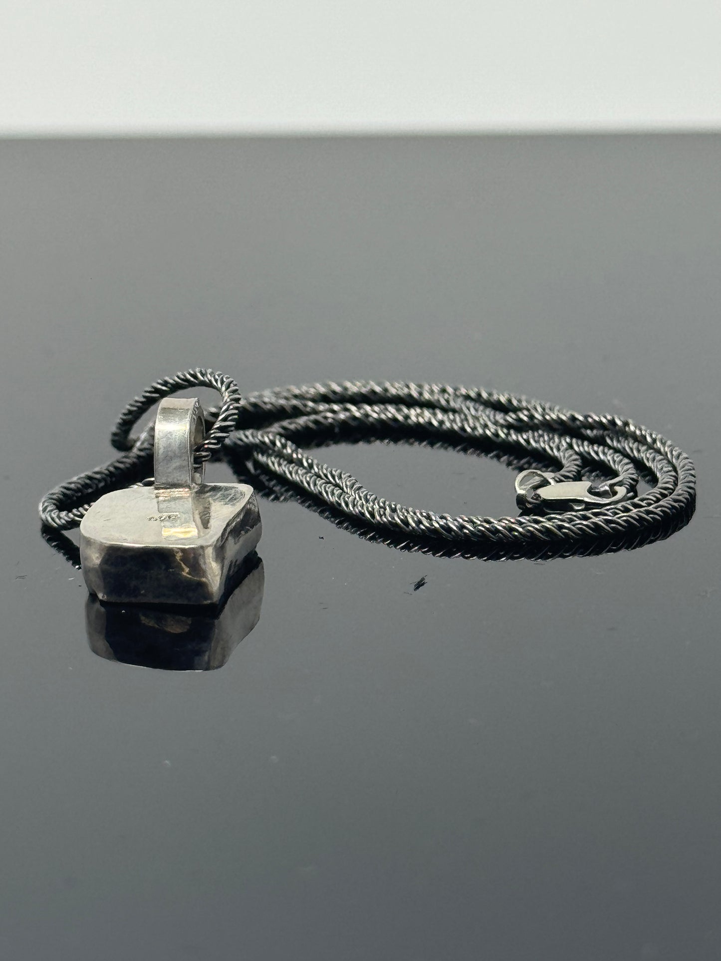 The Surface of the Moon Collection:
Genuine NWA 17679 Lunar Meteorite Silver Necklace - Handmade - One of a Kind