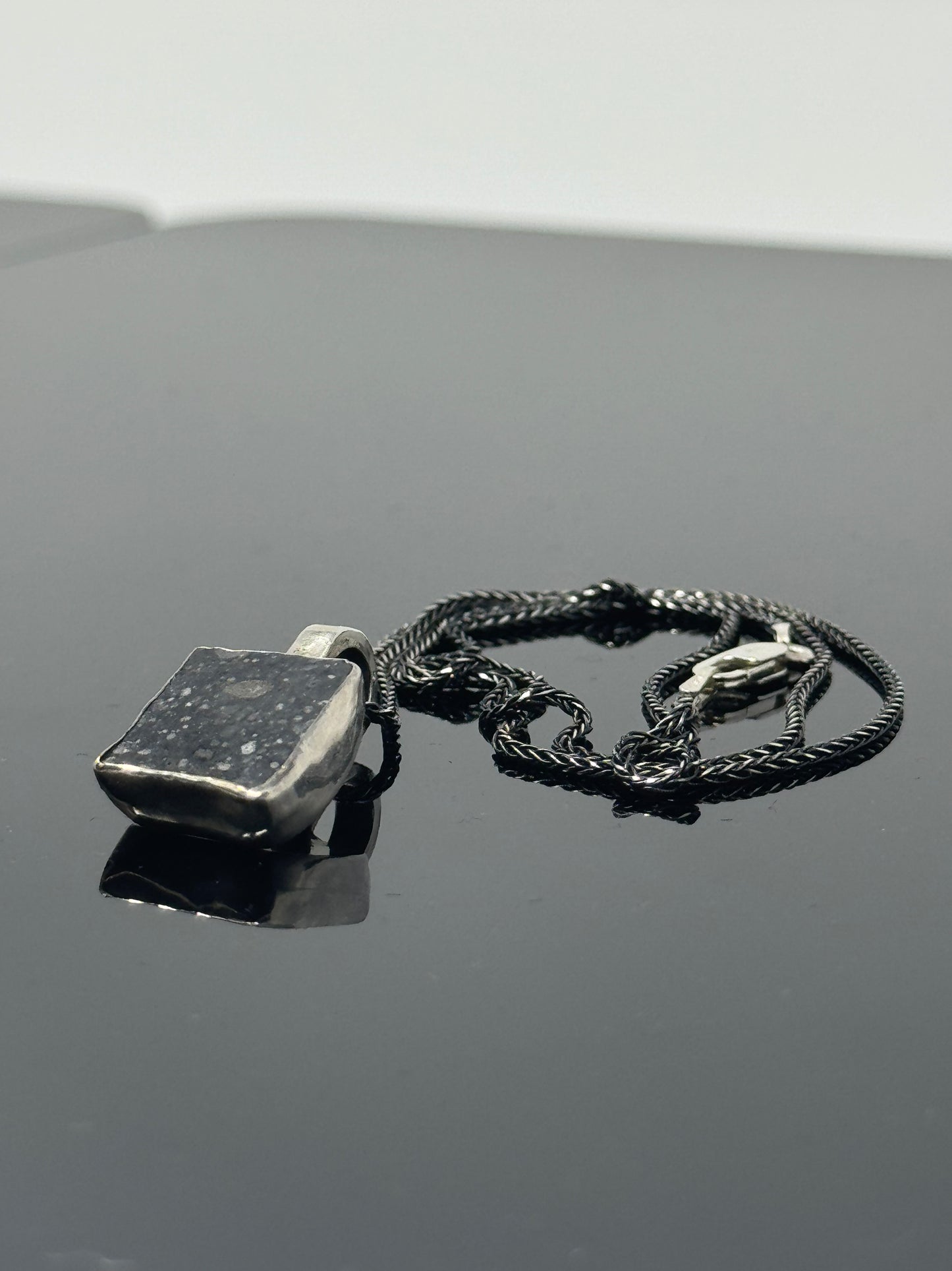 The Surface of the Moon Collection:
Genuine NWA 17679 Lunar Meteorite Silver Necklace - Handmade - One of a Kind
