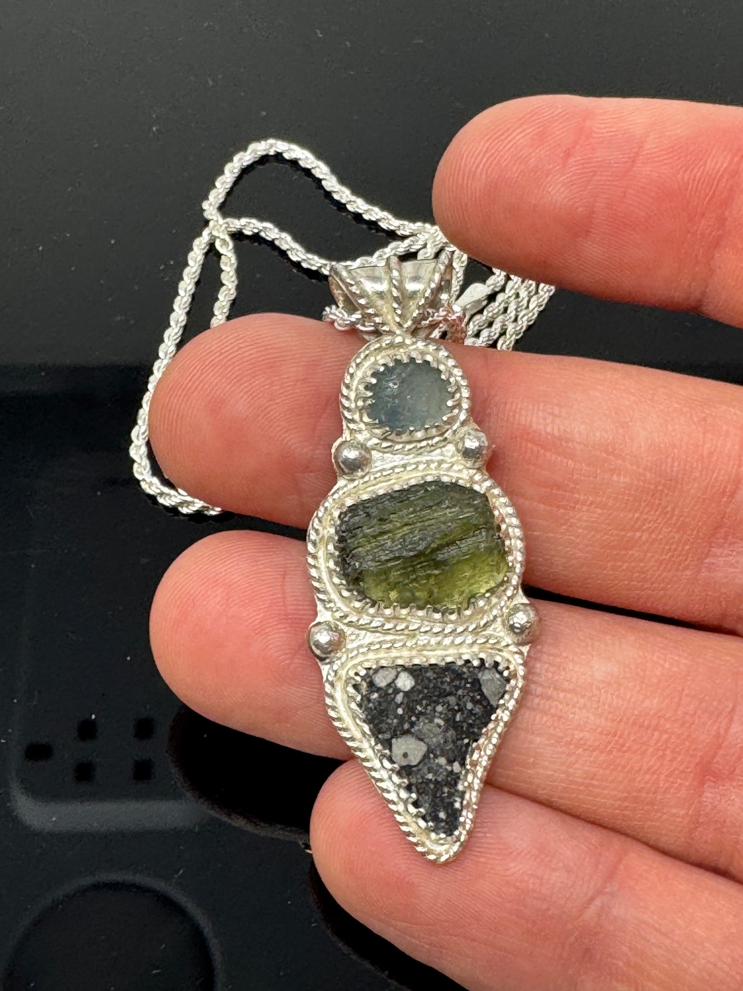 The Surface of the Moon Collection:
Stunning Genuine NWA 17679 Lunar Meteorite Silver Necklace w/ Raw Montana Sapphire and Moldavite - Handmade - One of a Kind!