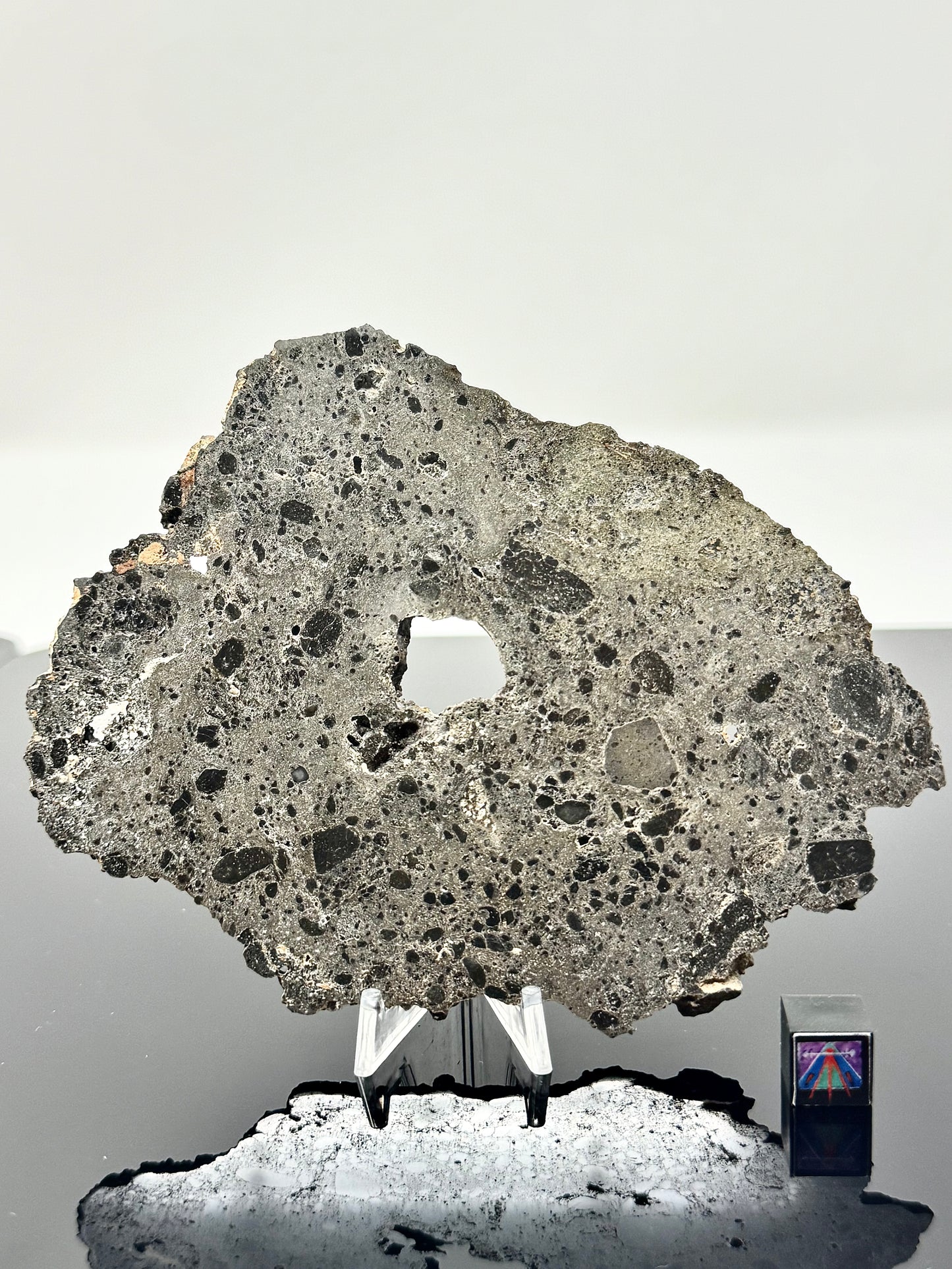 Unique and Rare NEA 089 Lunar Troctolitic Melt - 57.4g Full Slice with Hole Caused By Giant Pocket Of Vesicles!  Lunar Meteorite From Deep Within The Moon’s Crust