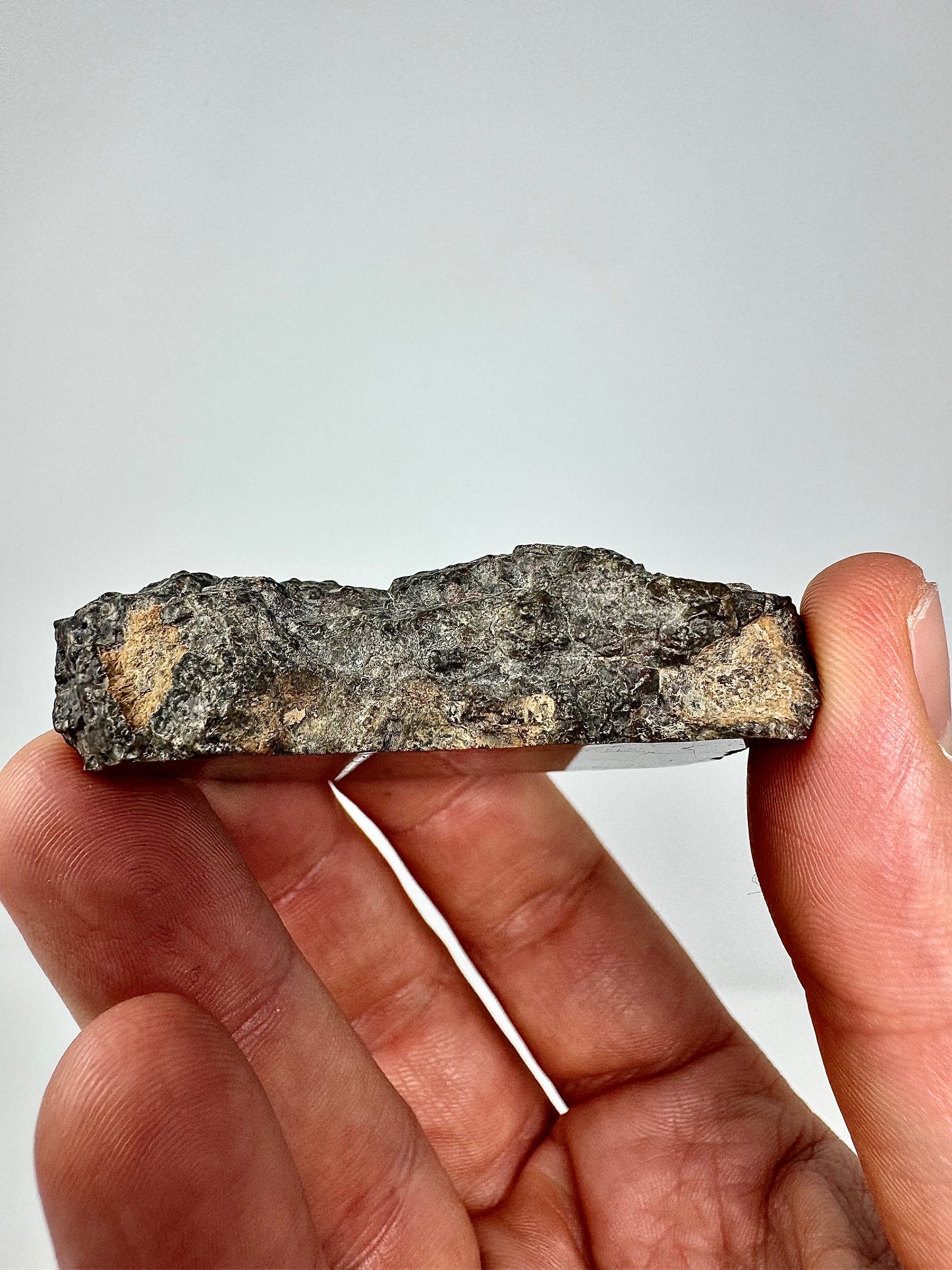 Laâyoune 002 Lunar Meteorite - POLISHED END CUT - Beautiful Shades Of Red - 55.5g